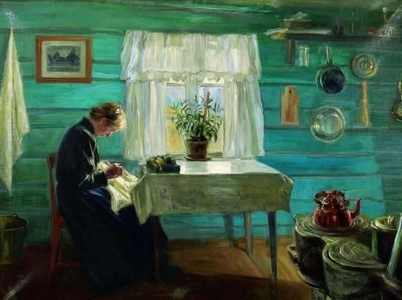 Donna che cuce in interno